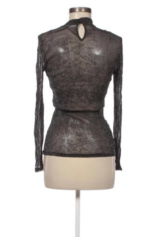 Γυναικεία μπλούζα SAINT, Μέγεθος M, Χρώμα Μαύρο, Τιμή 17,99 €