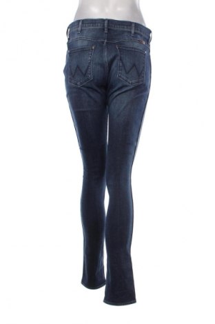 Damskie jeansy Wrangler, Rozmiar L, Kolor Niebieski, Cena 53,99 zł
