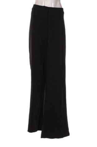 Dámské kalhoty  Guido Maria Kretschmer for About You, Velikost 3XL, Barva Černá, Cena  419,00 Kč