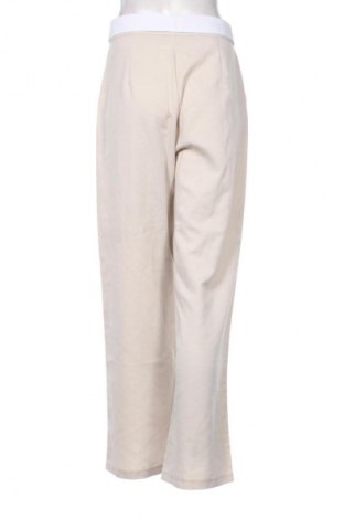 Damskie spodnie Unbranded, Rozmiar M, Kolor Beżowy, Cena 34,99 zł