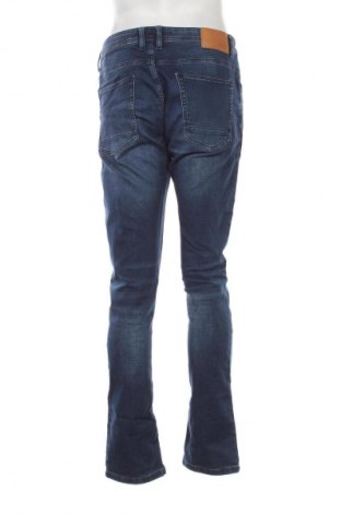 Męskie jeansy Smog, Rozmiar L, Kolor Niebieski, Cena 94,33 zł