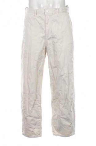 Męskie jeansy Uniqlo, Rozmiar M, Kolor Beżowy, Cena 110,99 zł