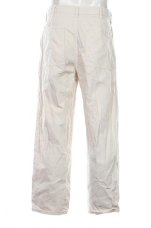 Męskie jeansy Uniqlo, Rozmiar M, Kolor Beżowy, Cena 110,99 zł