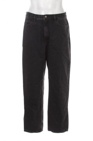 Męskie jeansy Uniqlo, Rozmiar L, Kolor Czarny, Cena 117,99 zł