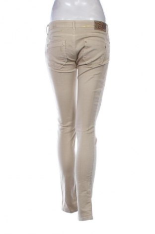 Дамски дънки Kocca, Размер L, Цвят Златист, Цена 38,34 €