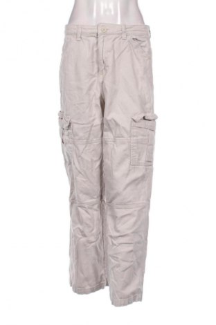 Damskie spodnie H&M Divided, Rozmiar L, Kolor Beżowy, Cena 27,40 zł