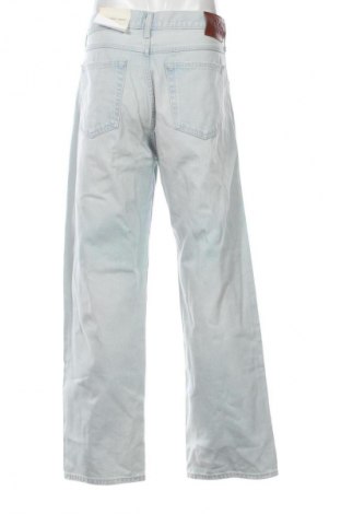 Męskie jeansy Calvin Klein Jeans, Rozmiar L, Kolor Niebieski, Cena 589,99 zł