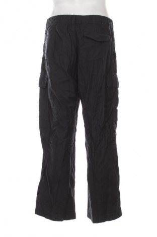 Pánské kalhoty  Uniqlo, Velikost XL, Barva Modrá, Cena  129,00 Kč