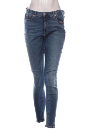 Damskie jeansy Calvin Klein Jeans, Rozmiar L, Kolor Niebieski, Cena 86,99 zł