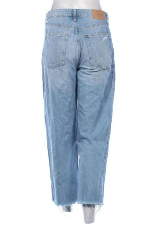 Damskie jeansy H&M, Rozmiar M, Kolor Niebieski, Cena 81,20 zł