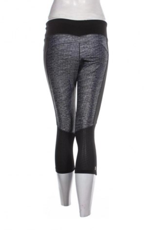 Damskie legginsy Domyos, Rozmiar M, Kolor Kolorowy, Cena 23,63 zł