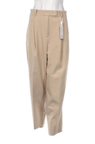 Damskie spodnie Tommy Hilfiger, Rozmiar XL, Kolor Beżowy, Cena 589,99 zł