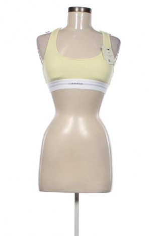 Γυναίκειο αθλητικό τοπ Calvin Klein, Μέγεθος S, Χρώμα Κίτρινο, Τιμή 41,99 €