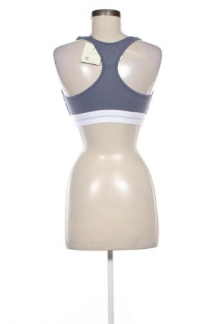 Damski sportowy top Calvin Klein Jeans, Rozmiar L, Kolor Niebieski, Cena 135,99 zł