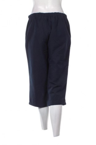 Дамско спортно долнище Reebok, Размер M, Цвят Син, Цена 11,24 €