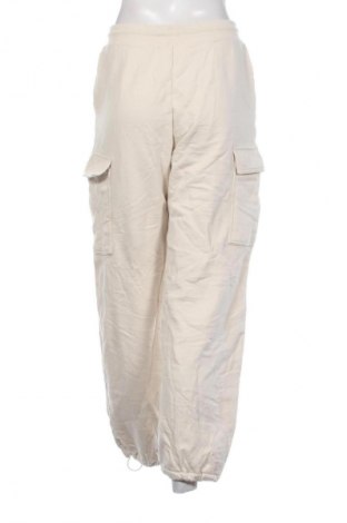 Dámské tepláky Uniqlo, Velikost M, Barva Krémová, Cena  319,00 Kč