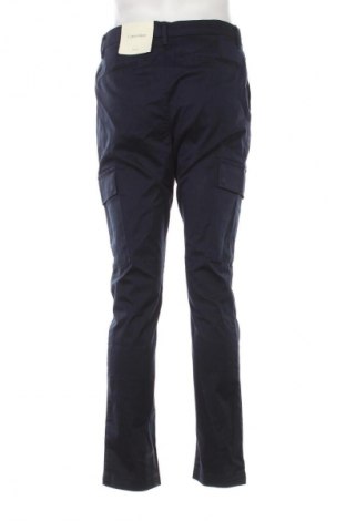 Męskie jeansy Calvin Klein, Rozmiar M, Kolor Niebieski, Cena 318,99 zł