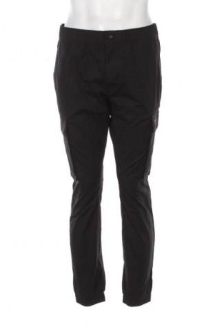 Pánské kalhoty  Calvin Klein Jeans, Velikost L, Barva Černá, Cena  1 029,00 Kč