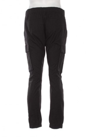 Pánské kalhoty  Calvin Klein Jeans, Velikost L, Barva Černá, Cena  1 029,00 Kč