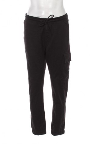 Pantaloni trening de bărbați Calvin Klein Jeans, Mărime L, Culoare Negru, Preț 371,99 Lei