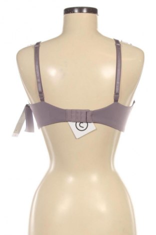 Biustonosz Calvin Klein, Rozmiar L, Kolor Fioletowy, Cena 201,99 zł