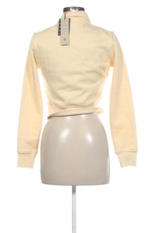 Bluzka damska Tommy Jeans, Rozmiar XS, Kolor Żółty, Cena 452,99 zł