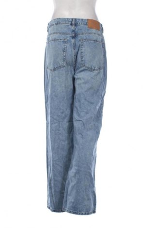 Damskie jeansy H&M Divided, Rozmiar M, Kolor Niebieski, Cena 52,99 zł