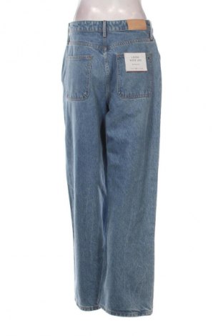 Damskie jeansy Tommy Hilfiger, Rozmiar M, Kolor Niebieski, Cena 674,99 zł