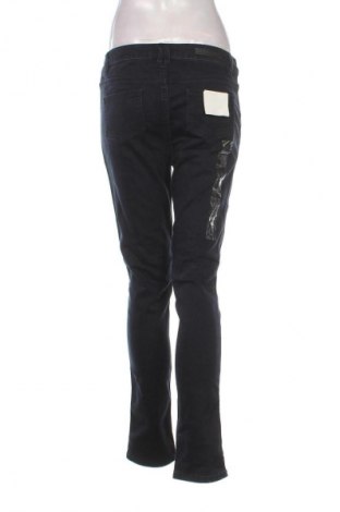 Damskie spodnie By Bettina Liano, Rozmiar L, Kolor Niebieski, Cena 53,99 zł