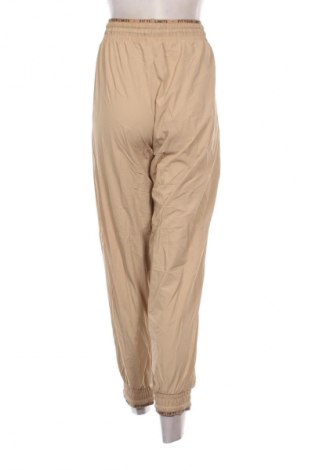 Pantaloni de femei Decathlon, Mărime L, Culoare Bej, Preț 22,99 Lei