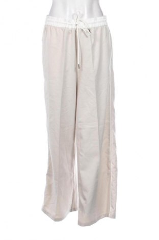 Damskie spodnie H&M Divided, Rozmiar L, Kolor Beżowy, Cena 25,99 zł