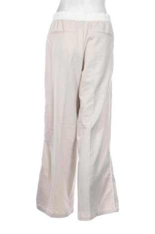 Damskie spodnie H&M Divided, Rozmiar L, Kolor Beżowy, Cena 25,99 zł