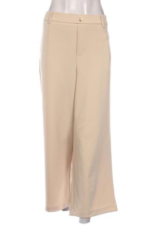 Damskie spodnie One, Rozmiar XL, Kolor Beżowy, Cena 39,99 zł