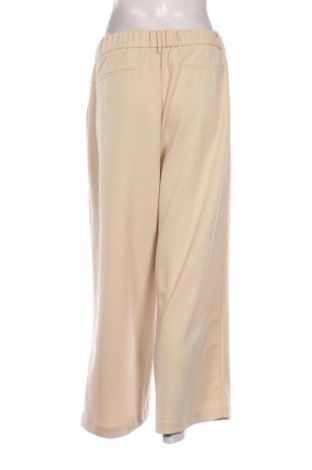 Damskie spodnie One, Rozmiar XL, Kolor Beżowy, Cena 39,99 zł