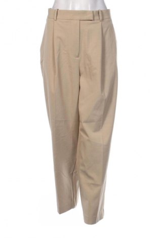 Pantaloni de femei Tommy Hilfiger, Mărime XL, Culoare Bej, Preț 141,99 Lei
