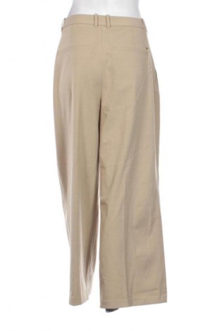 Damskie spodnie Tommy Hilfiger, Rozmiar L, Kolor Beżowy, Cena 589,99 zł
