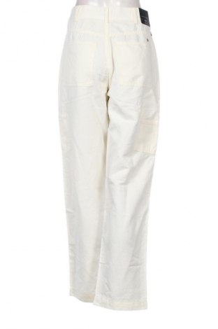 Damskie spodnie Tommy Hilfiger, Rozmiar L, Kolor ecru, Cena 674,99 zł