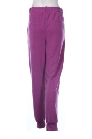 Damskie spodnie sportowe Ladies Fashion, Rozmiar L, Kolor Fioletowy, Cena 27,99 zł