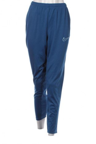 Pantaloni trening de femei Nike, Mărime L, Culoare Albastru, Preț 156,99 Lei