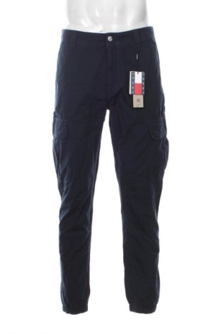 Męskie spodnie Tommy Jeans, Rozmiar M, Kolor Niebieski, Cena 318,99 zł