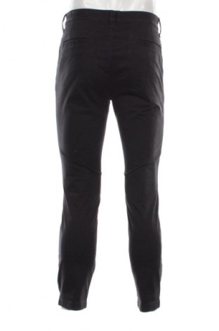 Pánské kalhoty  Tommy Jeans, Velikost M, Barva Černá, Cena  689,00 Kč