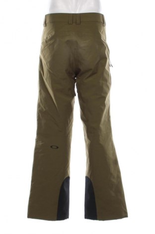 Herrenhose für Wintersport Oakley, Größe M, Farbe Grün, Preis € 164,99