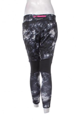 Γυναικείο κολάν Skechers, Μέγεθος L, Χρώμα Πολύχρωμο, Τιμή 17,99 €