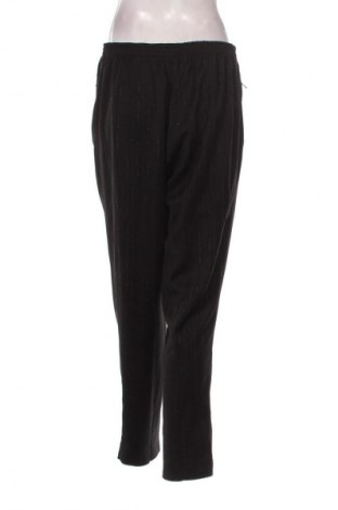 Дамски панталон New Fashion, Размер XL, Цвят Многоцветен, Цена 6,13 €