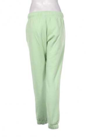 Γυναικείο αθλητικό παντελόνι New Balance, Μέγεθος XS, Χρώμα Πράσινο, Τιμή 15,00 €
