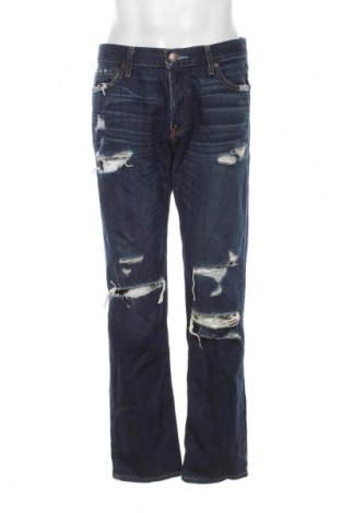 Męskie jeansy Hollister, Rozmiar L, Kolor Niebieski, Cena 36,99 zł