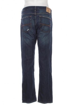 Męskie jeansy Hollister, Rozmiar L, Kolor Niebieski, Cena 36,99 zł