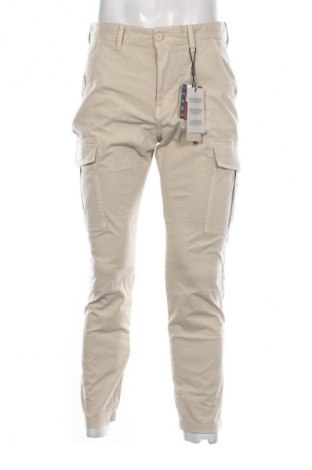 Męskie spodnie Tommy Jeans, Rozmiar M, Kolor Beżowy, Cena 492,99 zł