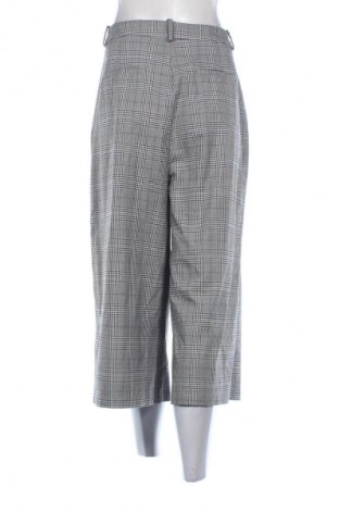 Damskie spodnie Reserved, Rozmiar L, Kolor Kolorowy, Cena 80,99 zł