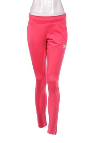 Damskie spodnie sportowe Adidas, Rozmiar XS, Kolor Różowy, Cena 82,99 zł